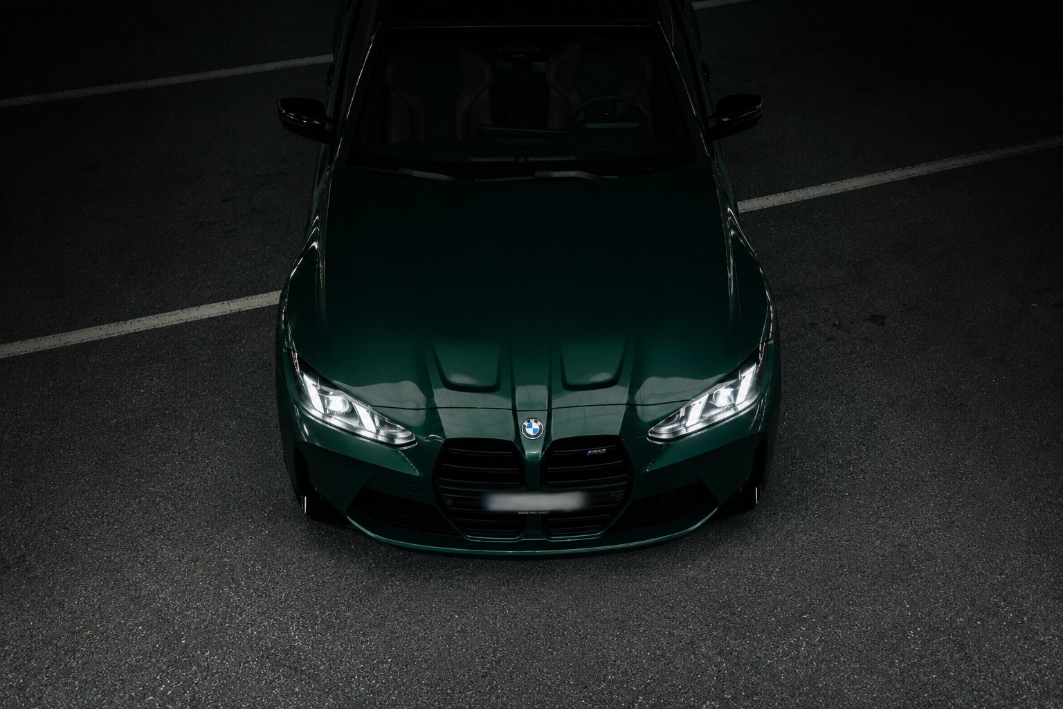 BMW M4 Competition verte photographiée en plongée